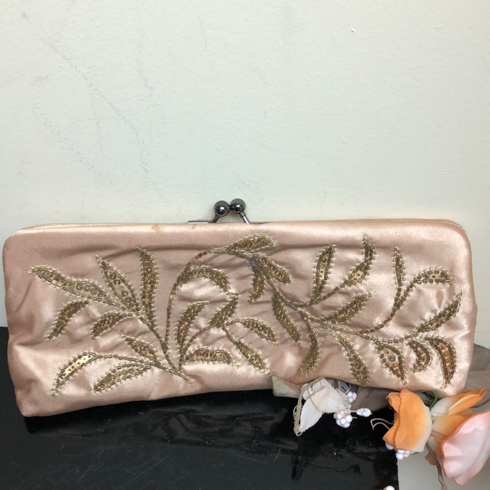 B. Cavalli gold sequence clutch purse